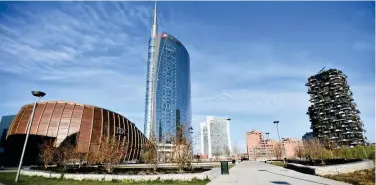  ?? ?? ↑
A general view of Unicredit Tower and a residentia­l tower in Milan, Italy.