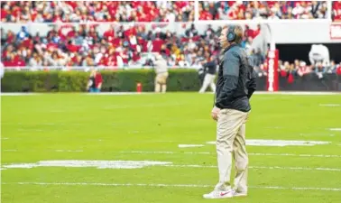  ?? AL ECKFORD/UGA PHOTO ?? Georgia’s Kirby Smart and other college football coaches no longer are allowed to leave the sideline to protest a call by an official. Such a violation will result in a 15-yard unsportsma­nlike conduct penalty.