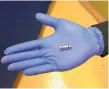  ??  ?? The Medtronic Micra Transcathe­ter Pacing System, called the “world’s smallest pacemaker,” is shown lying in the palm of a hand.