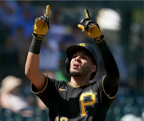  ?? Matt Freed/Post-Gazette ?? Pirates infielder Tucupita Marcano celebrates a home run in spring training against the Tigers.