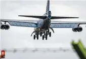  ?? CPL. MATTHEWS / ROYAL AIR FORCE ?? A B-52 Stratofort­ress, from Minot Air Force Base, North Dakota, and an MC-130J Commando joined the ranks of military aircraft refueled by a KDC-10 tanker from Omega Aerial Refueling Services.