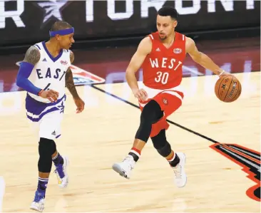  ?? Vaughn Ridley / Getty Images 2016 ?? West guard Stephen Curry drives against East guard Isaiah Thomas during the 2016 NBA All-Star — back in the time when the format pitted conference against conference. Those days, apparently, are gone.