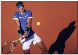  ?? (Photos AFP/EPA) ?? Rafael Nadal n’a fait qu’une bouchée de Dominic Thiem, qui avait pourtant sorti Novak Djokovic en quarts...