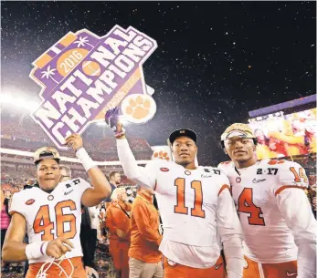  ?? KIM KLEMENT, USA TODAY SPORTS ?? Clemson players celebrate in January after defeating Alabama for the College Football Playoff title, giving the Atlantic Coast Conference its second national champion in four years.