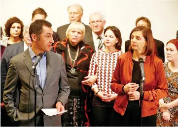  ??  ?? Leaders of the German Green Party Katrin Goering-Eckardt and Cem Ozdemir speak to the media after the explorator­y talks about forming a new coalition government collapsed. — Reuters photo