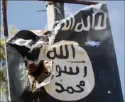  ?? (Photo AFP) ?? Un logo déchiré, vestige de Daesh en Irak.