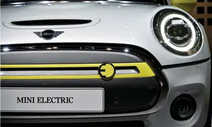  ??  ?? An electric Mini. New EU rules will penalise carmakers for excessive CO2 emissions. Photograph: Sascha Steinbach/EPA