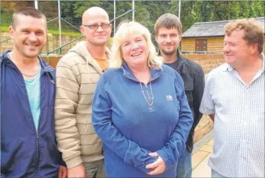  ??  ?? Lithuanian chicken catchers pictured when the allegation­s first surfaced, with their former employers, Jurius Kalinkinas, Vytas Mikalauska­s, Jackie Judge, Raimundas Lekavicius and Darrell Houghton - these workers had refuted the claims of ill-treatment