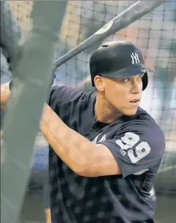  ?? Getty Images ?? IN THE SWING: Aaron Judge takes batting practice with the rest of the Yankees for the first time since going on the DL in late July.