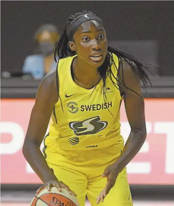  ?? AP Photo / Phelan M. Ebenhack ?? Ezi Magbegor sets up a play for the Seattle Storm during game two of the 2020 WNBA finals against the Las Vegas Aces last month.