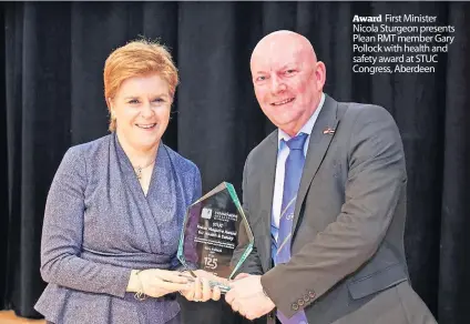  ?? ?? Award First Minister Nicola Sturgeon presents Plean RMT member Gary Pollock with health and safety award at STUC Congress, Aberdeen