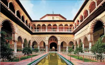  ?? DOMINIC ARIZONA BONUCCELLI/RICK STEVES’ EUROPE PHOTOS ?? At Sevilla’s Alcazar, Christian king Pedro I built his palace around water, like the Moors who preceded him. They viewed water — so rare and precious in most of the Islamic world — as the purest symbol of life.