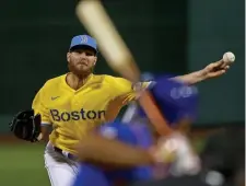  ?? ?? CRUISING: Chris Sale pitches during the first inning against the Mets on Wednesday night at Fenway Park.