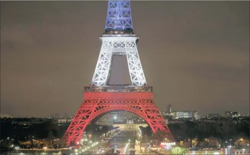  ?? PICTURE: REUTERS ?? The Eiffel Tower lit with the blue, white and red colours of the French flag in Paris this week following a series of deadly attacks on Friday in the French capital. Along with the attack in Beirut 24 hours earlier, they had been planned for a long...