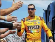  ?? THE ASSOCIATED PRESS FILE PHOTO ?? Kyle Busch greets fans during driver introducti­ons prior to a race earlier this year.