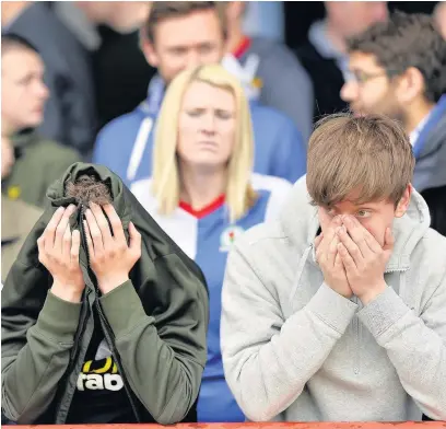 ?? Justin Setterfiel­d ?? Blackburn supporters come to terms with relegation to the third tier