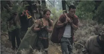  ??  ?? Alicia Vikander and Daniel Wu struggle on in ‘Tomb Raider’