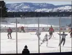  ?? RICH PEDRONCELL­I — THE ASSOCIATED PRESS ?? Members of the Colorado Avalanche, in white, and the Vegas Golden Knights, red play during the first period of the Outdoor Lake Tahoe game in Stateline, Nev., on Saturday.