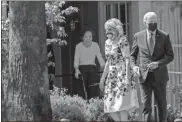  ?? Ap-evan Vucci ?? Former first lady Rosalynn Carter looks on as President Joe Biden and first lady Jill Biden leave the home of former President Jimmy Carter during a trip to mark Biden’s 100th day in office, Thursday, in Plains, Ga.