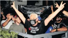  ?? | REUTERS ?? ROGER Stone reacts after US President Donald Trump commuted his federal prison sentence, outside his residence in Fort Lauderdale, Florida, on Friday.