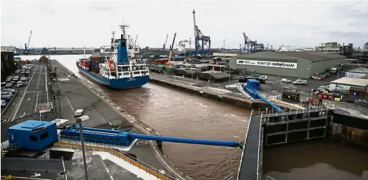  ??  ?? Going with the flow: The container ship ‘Anja’ arriving into the Port of Immingham operated by the ABP on the south bank of the Humber Estuary. — AFP