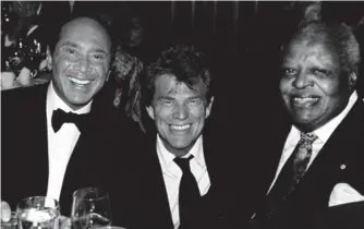  ?? TOM SANDLER PHOTOS ?? 2002 Paul Anka, David Foster and Oscar Peterson at a Royal Conservato­ry of Music event at the Windsor Arms Hotel: "To me it was an obvious shot to take: three musical icons, wearing tuxes!"