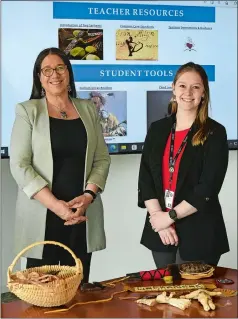  ?? DANA JENSEN THE DAY ?? Beth Regan, vice chairwoman of the Mohegan Council of Elders, left, and Samantha Cholewa, director of curriculum and instructio­n, on Friday at the Mohegan Government Center in Uncasville. On the table are items they would use while teaching about their history and culture.