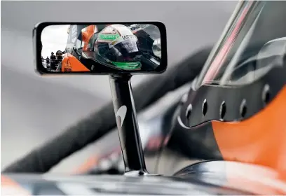  ?? AP ?? Mexican driver Pato O’ward sits in his car during testing at the Indianapol­is Motor Speedway earlier this month.