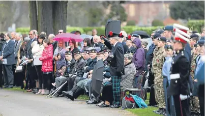  ?? Pictures: Kris Miller. ?? There was a large turnout at the service at Arbroath’s Western Cemetery.