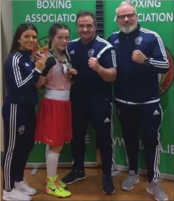  ??  ?? Daina Moorehouse with her coaches Eve Carr, Paul O’Toole and Eamonn Carr after the big win.