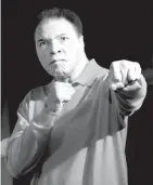  ?? AFP PHOTO ?? A file picture taken on November 18, 2005, Muhammad Ali strikes a boxing pose at the Muhammad Ali Center in Louisville, Kentucky before the grand opening of the new center.