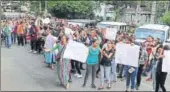  ?? HT PHOTO ?? Angry protesters stormed the Secretaria­t in Shillong on Monday, demanding the removal of residents of Them Metor (sweeper colony). The crowd was pacified by CM Conrad Sangma.