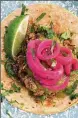  ?? PHOTOS COURTESY OF BOTICA ?? Mimmo Alboumeh is the chef-owner of Botica, which is located in the space formerly occupied by Watershed. The Pork pibil taco is inspired by tacos he encountere­d on the streets of Mexico City.