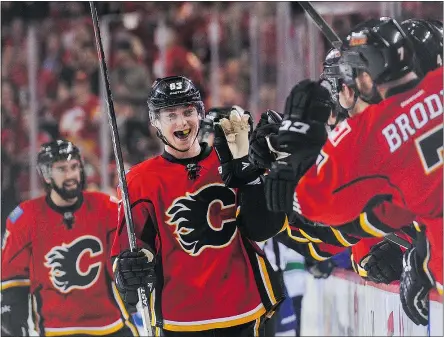 ?? — GETTY IMAGES ?? Calgary Flames forward Sam Bennett celebrates after scoring against the Vancouver Canucks in Game 3 of the first-round series Sunday. Calgary drafted Bennett fourth overall last summer.