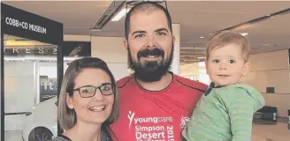  ?? Picture: Contribute­d ?? SMASHING TARGETS: Toowoomba real estate agent Brendan Mayles, with his wife Kate and son Oliver, have raised more than $14,000 for Youngcare.