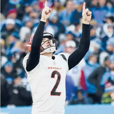  ?? MARK HUMPHREY/AP ?? Bengals kicker Evan McPherson hit a 52-yard field goal as time expired to win Saturday’s playoff game against the Titans.