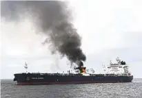  ?? INDIAN NAVY VIA AP ?? Smoke rises from the oil tanker Marlin Luanda on Saturday after an attack by Houthi rebels in the Gulf of Aden.