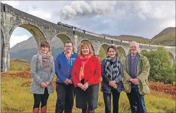  ?? Photograph: The Write Image. ?? Cabinet Secretary Fiona Hyslop, centre, was at Glenfinnan Viaduct on Friday as the Jacobite steam train passed over, to announce funding for new car and coach parking. Also pictured, from the left, are Ingrid Henderson and Duncan Gibson from Glenfinnan Community Council, Corrine MacDougall from Bidwells and Councillor Allan Henderson.