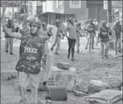  ?? PTI FILE ?? Police personnel and protesters clash during a rally against the ■ amended Citizenshi­p Act and NRC in Mangaluru on Dec 19.