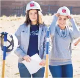  ?? MARLA BROSE/JOURNAL ?? La Cueva High seniors Lauren Hewitt, left, and Megan Fairchild get ready to break ground on a new special education wing, new weight room and renovated athletic facilities at the school on Tuesday.