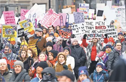  ?? JACK GRUBER/USA TODAY ?? Those who turned out for the third Women’s March on Saturday in Washington, D.C., battled bitter cold weather.