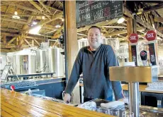  ?? TIFFANY MAYER/SPECIAL TO POSTMEDIA NETWORK ?? Ed Madronich, proprietor of Flat Rock Cellars in Jordan, is shown in his latest venture, The Shawn & Ed Brewing Co., a brewery in Dundas.