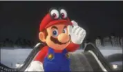  ?? NINTENDO ?? Cappy gives Mario new abilities — the most notable being to take over enemies and use their powers.