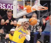  ?? MARCIO JOSE SANCHEZ/ASSOCIATED PRESS ?? Russell Westbrook dunks during Tuesday’s game for the Lakers against Oklahoma City in Los Angeles.