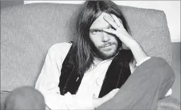  ?? Gary Burden Warner Bros. Records ?? NEIL YOUNG and his band opened the Roxy in 1973 by performing all the songs on his just-recorded album.