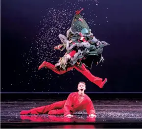  ?? (Photo credit: Keith Sutter) ?? Smuin artist Oliver-Paul Adams looks on in amazement at the dancing tree in Rex
Wheeler’s “Christmas Tree Rock,” part of Smuin’s “The Christmas Ballet,” touring the Bay Area now through December 26.