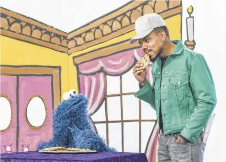  ??  ?? Chance the Rapper in “T is for Theater” with Cookie Monster.