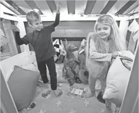  ??  ?? Left: Mel and his sister Elise play in their playhouse. Elise and Mel have a metabolic disorder called propionic acidemia. Elise was diagnosed shortly after birth and is a typically developing 5-year-old.