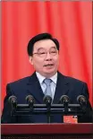  ?? SHEN HONG / XINHUA ?? Wang Chen, vice-chairman of the country’s top legislatur­e, reports on a draft of its decision on strengthen­ing Hong Kong’s legal system and enforcemen­t mechanisms on national security, and the draft civil code in Beijing on Friday.