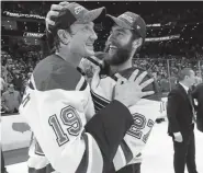  ?? Bruce Bennett, Getty Images ?? Jay Bouwmeeste­r, left, and Alex Pietrangel­o of the St. Louis Blues celebrate after defeating the Boston Bruins 4-1 on Wednesday night to win the Stanley Cup.